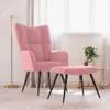 A pink velvet armchair and matching ottoman are placed in a room with a floor lamp and a small side table with a vase of flowers. Voir les images du produit