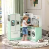 A young child is playing with a toy kitchen set in a room with a window and a rug. Produktbild-Vorschau