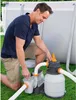 A man is kneeling and adjusting a pool pump and filter system next to an above-ground swimming pool. Produktbild-Vorschau