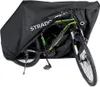 A black bicycle cover is partially covering a bicycle, with the bicycle's frame and wheels visible. Náhľad obrázku produktu