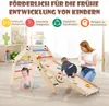 A mother and two children playing on a wooden climbing triangle indoors. Produktbild-Vorschau