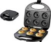 A donut maker is open with donuts in the bottom plate, and another closed donut maker is beside it. Náhled obrázku produktu