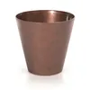A copper-colored planter pot on a white background. Náhľad obrázku produktu