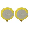 Two coin cell batteries with metal contacts, presented against a white background. Produktbild-Vorschau