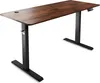 A standing desk with a wooden top and black metal legs, shown against a white background. Náhľad obrázku produktu