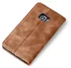 A brown leather flip case for a smartphone is shown from a diagonal top-down perspective against a white background. Produktbild-Vorschau
