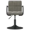 A studio shot of a gray velvet dining chair with a black base. Anteprima dell’immagine prodotto