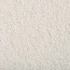 A close-up, textured view of a white fabric. Podgląd zdjęcia produktu