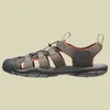 A side view of a single men's sandal against a plain background. Voir les images du produit