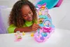 A young girl is playing with a Polly Pocket toy. Podgląd zdjęcia produktu