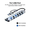 A USB-C hub with multiple ports, shown with its connecting cable and USB-A adapter. Produktbild-Vorschau