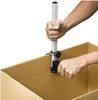A person is using a tool to adjust the height of a cardboard box. Náhľad obrázku produktu