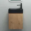 A modern bathroom vanity with a black sink and a wood-grain cabinet against a gray tiled wall. Produktbild-Vorschau