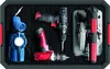 A collection of power tools and accessories neatly arranged in a black toolbox. Voir les images du produit
