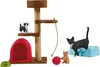 A set of cat toys and accessories, including a scratching post, a red tent, toy balls, food bowls, and cat figurines. Anteprima dell’immagine prodotto