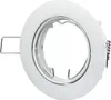 A white recessed spotlight housing with a silver inner ring and spring clips. Voir les images du produit