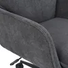 A close-up view of the armrest and side of a dark gray fabric office chair. Produktbild-Vorschau