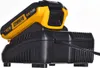 A Dewalt battery charger with a Dewalt battery inserted. Produktbild-Vorschau