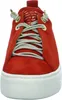 A close-up front view of a red sneaker with a white platform sole. Náhľad obrázku produktu