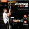 A man is performing a fitness exercise using a climbing rope in a gym setting. Produktbild-Vorschau