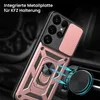 A rose gold phone case with a built-in ring holder and camera cover is shown attached to a car vent mount. Produktbild-Vorschau
