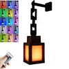 A collage of images showing a wall-mounted lamp with a chain design, illuminated in various colors, and a remote control. Produktbild-Vorschau