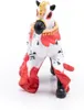 A toy horse with a decorative saddle and ornate patterns. Produktbild-Vorschau