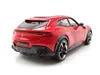 A red Ferrari Purosangue model car is shown from a rear-quarter angle on a white background. Anteprima dell’immagine prodotto