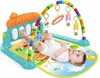 A baby is lying on a playmat and kicking the keys of an interactive piano. Produktbild-Vorschau
