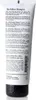 Back of a white tube of shampoo with black text and a black cap. Produktbild-Vorschau