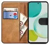 A book-style phone case with a phone inserted, showing cards and banknotes in the wallet section. Produktbild-Vorschau