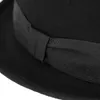 A close-up shot of a black hat, focusing on the ribbon detail. Anteprima dell’immagine prodotto