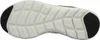 The sole of a black and white shoe is shown from an underneath view. Voir les images du produit