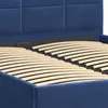 A close-up view of a blue upholstered bed frame with wooden slats. Produktbild-Vorschau