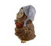 A figurine of an owl wearing a nightcap, holding a candle and a teddy bear. Produktbild-Vorschau