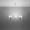 A white chandelier hanging from a white ceiling against a light gray wall. Anteprima dell’immagine prodotto