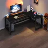 A gaming computer desk setup in a room with ambient lighting. Produktbild-Vorschau