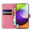 A pink flip phone case with floral and butterfly designs, showing credit cards and a banknote inside, with a smartphone displayed. Produktbild-Vorschau