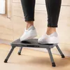 Person using a step stool in a kitchen. Produktbild-Vorschau