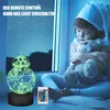 A child sits by a window at night, holding a teddy bear and looking out at the stars. A Star Wars BB-8 lamp is lit up on a table, with a remote control nearby. Produktbild-Vorschau