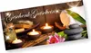 A spa-themed gift certificate with candles, stones, and a lotus flower. Produktbild-Vorschau