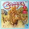 The image shows the box art for the board game Camel Up, featuring cartoon camels racing in a desert with pyramids in the background. Produktbild-Vorschau