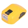 A yellow battery adapter/converter with black buttons and a reflective surface. Náhled obrázku produktu