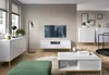 A modern living room with a white highboard, a TV, and a coffee table. Produktbild-Vorschau