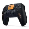 A black and orange limited edition Sony DualSense wireless controller for the PlayStation 5. Produktbild-Vorschau