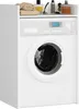 A white washing machine cabinet with a shelf on top holding towels and toiletries.