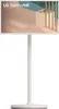 A white LG StandbyME television on a white stand against a white background. Voir les images du produit