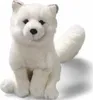 A plush toy arctic fox sitting on a white background. Produktbild-Vorschau