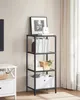 A tall, black metal shelf unit with books and decorative items on display, placed next to a white cabinet. Náhled obrázku produktu