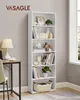A white bookshelf filled with decorative items and books, placed next to a desk with a lamp. Náhľad obrázku produktu